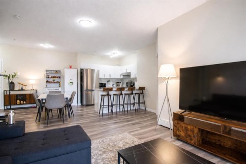 1117-1140 Taradale Drive Ne, Calgary, AB - Indoor Photo Showing Living Room