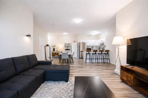 1117-1140 Taradale Drive Ne, Calgary, AB - Indoor Photo Showing Living Room