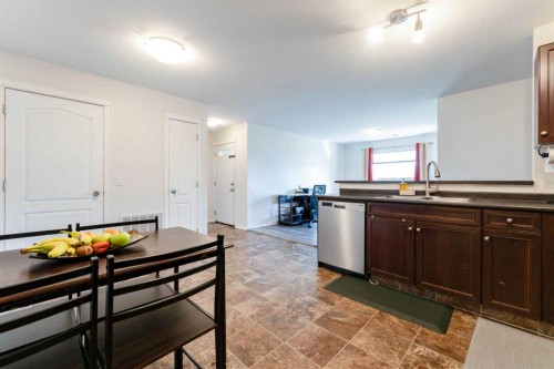 107-8 Bayside Place, Strathmore, AB - Indoor Photo Showing Kitchen