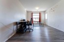 107-8 Bayside Place, Strathmore, AB  - Indoor Photo Showing Office 