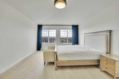 85 Evansborough Way Nw, Calgary, AB - Indoor Photo Showing Bedroom