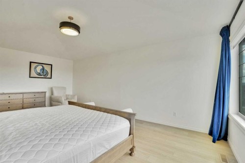 85 Evansborough Way Nw, Calgary, AB - Indoor Photo Showing Bedroom