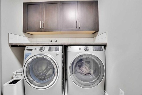 85 Evansborough Way Nw, Calgary, AB - Indoor Photo Showing Laundry Room