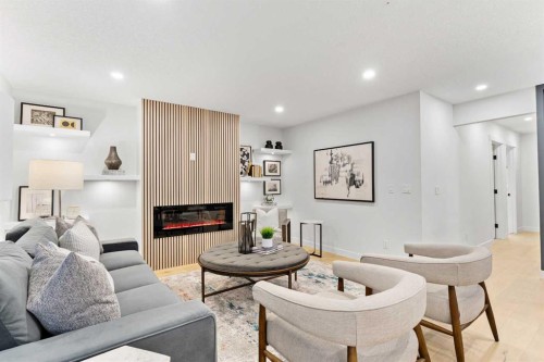 1731 111 Avenue Sw, Calgary, AB - Indoor Photo Showing Living Room With Fireplace