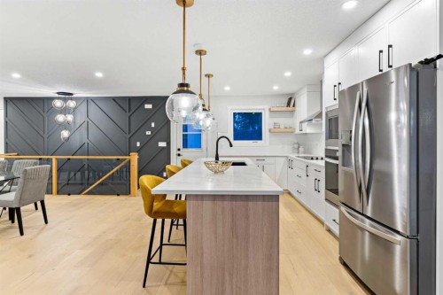 1731 111 Avenue Sw, Calgary, AB - Indoor Photo Showing Kitchen With Stainless Steel Kitchen With Upgraded Kitchen