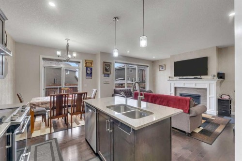 28 Saddlelake Common Ne, Calgary, AB - Indoor Photo Showing Other Room With Fireplace