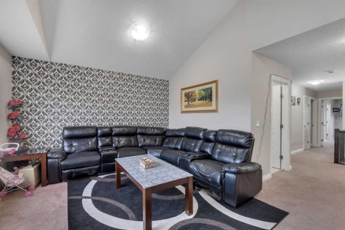 28 Saddlelake Common Ne, Calgary, AB - Indoor Photo Showing Living Room