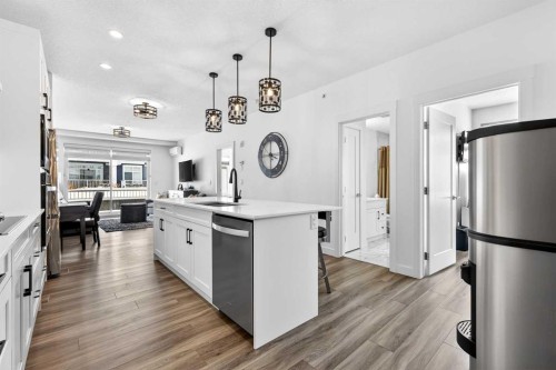 122-400 Auburn Meadows Common Se, Calgary, AB - Indoor Photo Showing Kitchen With Upgraded Kitchen