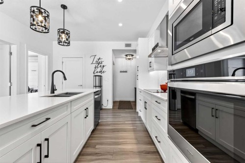 122-400 Auburn Meadows Common Se, Calgary, AB - Indoor Photo Showing Kitchen With Double Sink