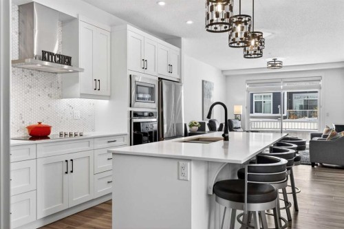 122-400 Auburn Meadows Common Se, Calgary, AB - Indoor Photo Showing Kitchen With Upgraded Kitchen