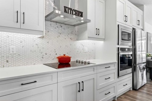 122-400 Auburn Meadows Common Se, Calgary, AB - Indoor Photo Showing Kitchen With Upgraded Kitchen