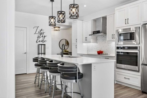 122-400 Auburn Meadows Common Se, Calgary, AB - Indoor Photo Showing Kitchen With Upgraded Kitchen