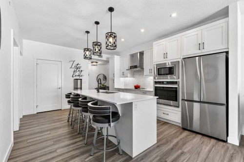122-400 Auburn Meadows Common Se, Calgary, AB - Indoor Photo Showing Kitchen With Upgraded Kitchen