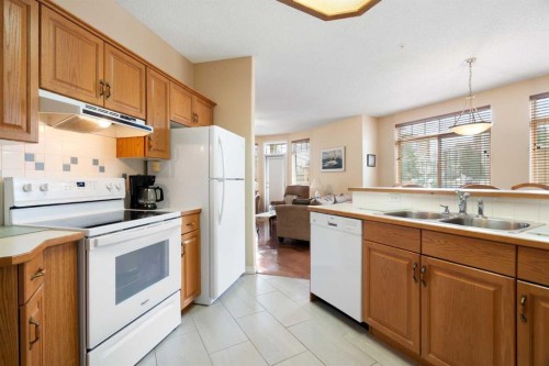 .-2107 Patterson View Sw, Calgary, AB - Indoor Photo Showing Kitchen With Double Sink