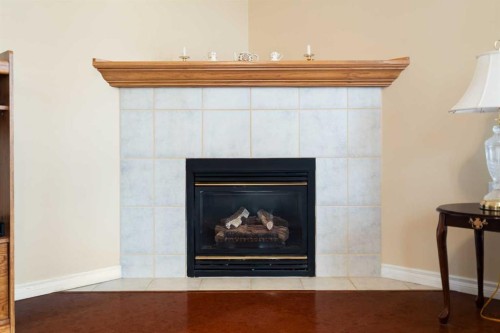 .-2107 Patterson View Sw, Calgary, AB - Indoor Photo Showing Living Room With Fireplace