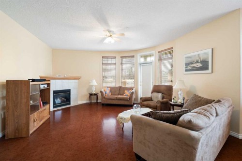 .-2107 Patterson View Sw, Calgary, AB - Indoor Photo Showing Living Room With Fireplace