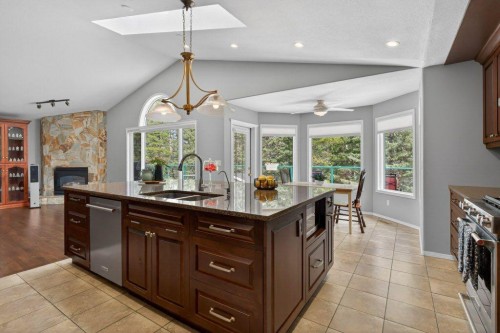 39 Highlands Terrace, Bragg Creek, AB - Indoor With Fireplace