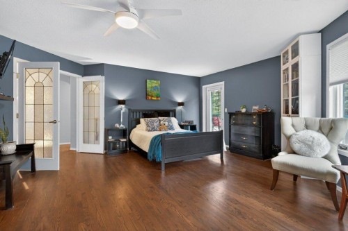 39 Highlands Terrace, Bragg Creek, AB - Indoor Photo Showing Bedroom