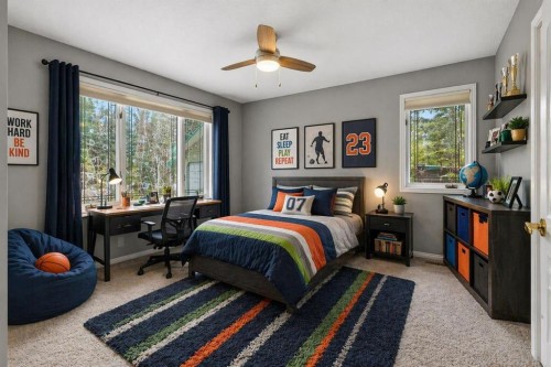 39 Highlands Terrace, Bragg Creek, AB - Indoor Photo Showing Bedroom