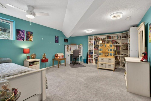 39 Highlands Terrace, Bragg Creek, AB - Indoor Photo Showing Bedroom