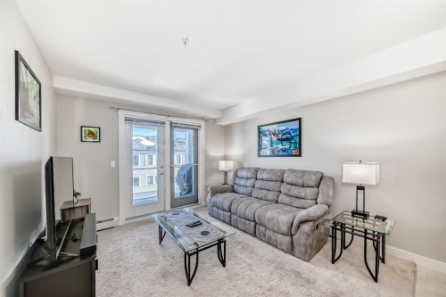 313-2300 Evanston Square Nw, Calgary, AB - Indoor Photo Showing Living Room