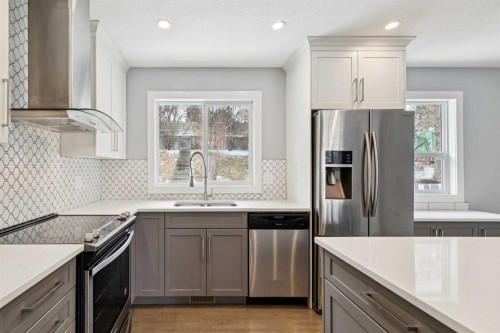 40 Henefer Road Sw, Calgary, AB - Indoor Photo Showing Kitchen With Stainless Steel Kitchen With Upgraded Kitchen
