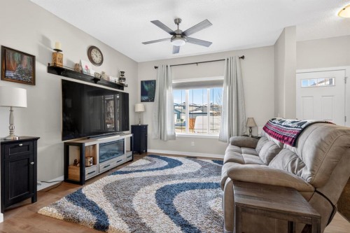 23 Belgian Link, Cochrane, AB - Indoor Photo Showing Living Room