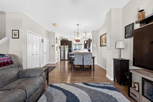 23 Belgian Link, Cochrane, AB - Indoor Photo Showing Living Room