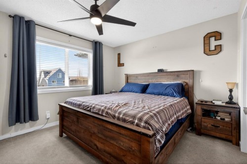 23 Belgian Link, Cochrane, AB - Indoor Photo Showing Bedroom