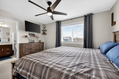 23 Belgian Link, Cochrane, AB - Indoor Photo Showing Bedroom