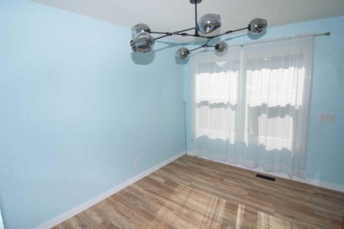 6-100 Pennsylvania Road Se, Calgary, AB - Indoor Photo Showing Other Room