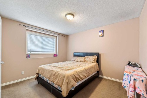 130 Invermere Drive, Chestermere, AB - Indoor Photo Showing Bedroom