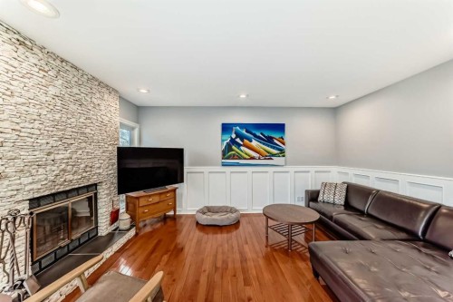 75 Sunmount Crescent Se, Calgary, AB - Indoor With Fireplace