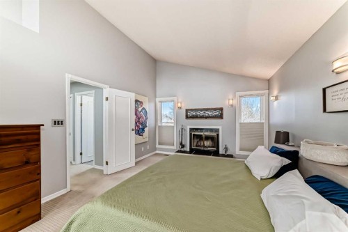 75 Sunmount Crescent Se, Calgary, AB - Indoor With Fireplace