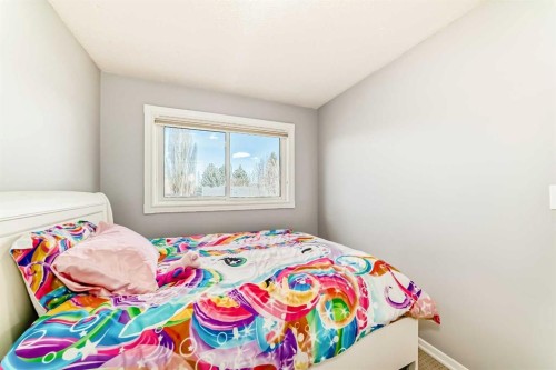 75 Sunmount Crescent Se, Calgary, AB - Indoor Photo Showing Bedroom