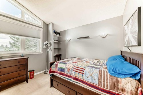 75 Sunmount Crescent Se, Calgary, AB - Indoor Photo Showing Bedroom