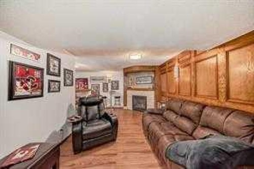 420 Whitehorn Place Ne, Calgary, AB - Indoor Photo Showing Living Room With Fireplace