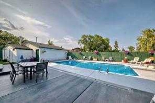 420 Whitehorn Place Ne, Calgary, AB - Outdoor With In Ground Pool With Backyard