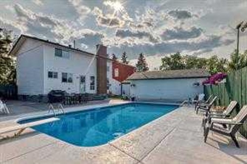 420 Whitehorn Place Ne, Calgary, AB - Outdoor With In Ground Pool