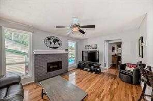 420 Whitehorn Place Ne, Calgary, AB - Indoor Photo Showing Living Room With Fireplace