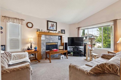 21 Citadel Crest Circle Nw, Calgary, AB - Indoor Photo Showing Living Room With Fireplace