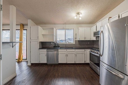 64 Castledale Crescent Ne, Calgary, AB - Indoor Photo Showing Kitchen With Stainless Steel Kitchen