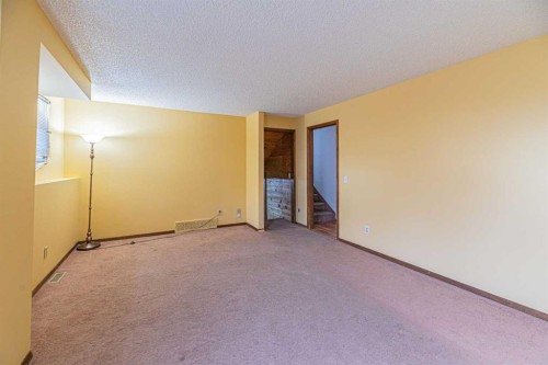 64 Castledale Crescent Ne, Calgary, AB - Indoor Photo Showing Other Room