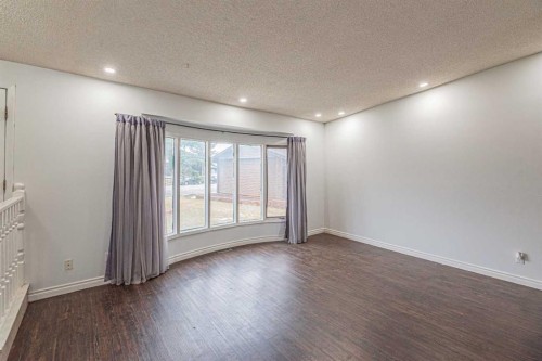 64 Castledale Crescent Ne, Calgary, AB - Indoor Photo Showing Other Room