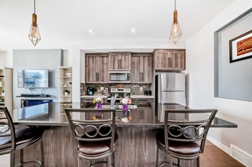 1016 Lanark Boulevard Se, Airdrie, AB - Indoor Photo Showing Kitchen With Stainless Steel Kitchen
