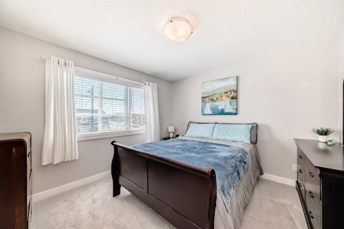 1016 Lanark Boulevard Se, Airdrie, AB - Indoor Photo Showing Bedroom