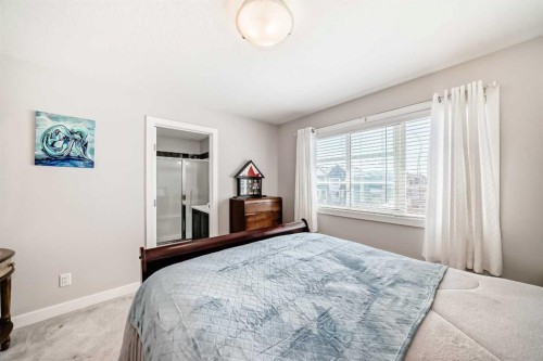 1016 Lanark Boulevard Se, Airdrie, AB - Indoor Photo Showing Bedroom