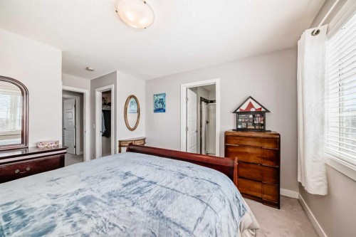 1016 Lanark Boulevard Se, Airdrie, AB - Indoor Photo Showing Bedroom