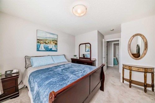1016 Lanark Boulevard Se, Airdrie, AB - Indoor Photo Showing Bedroom