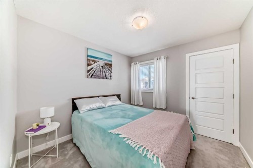 1016 Lanark Boulevard Se, Airdrie, AB - Indoor Photo Showing Bedroom